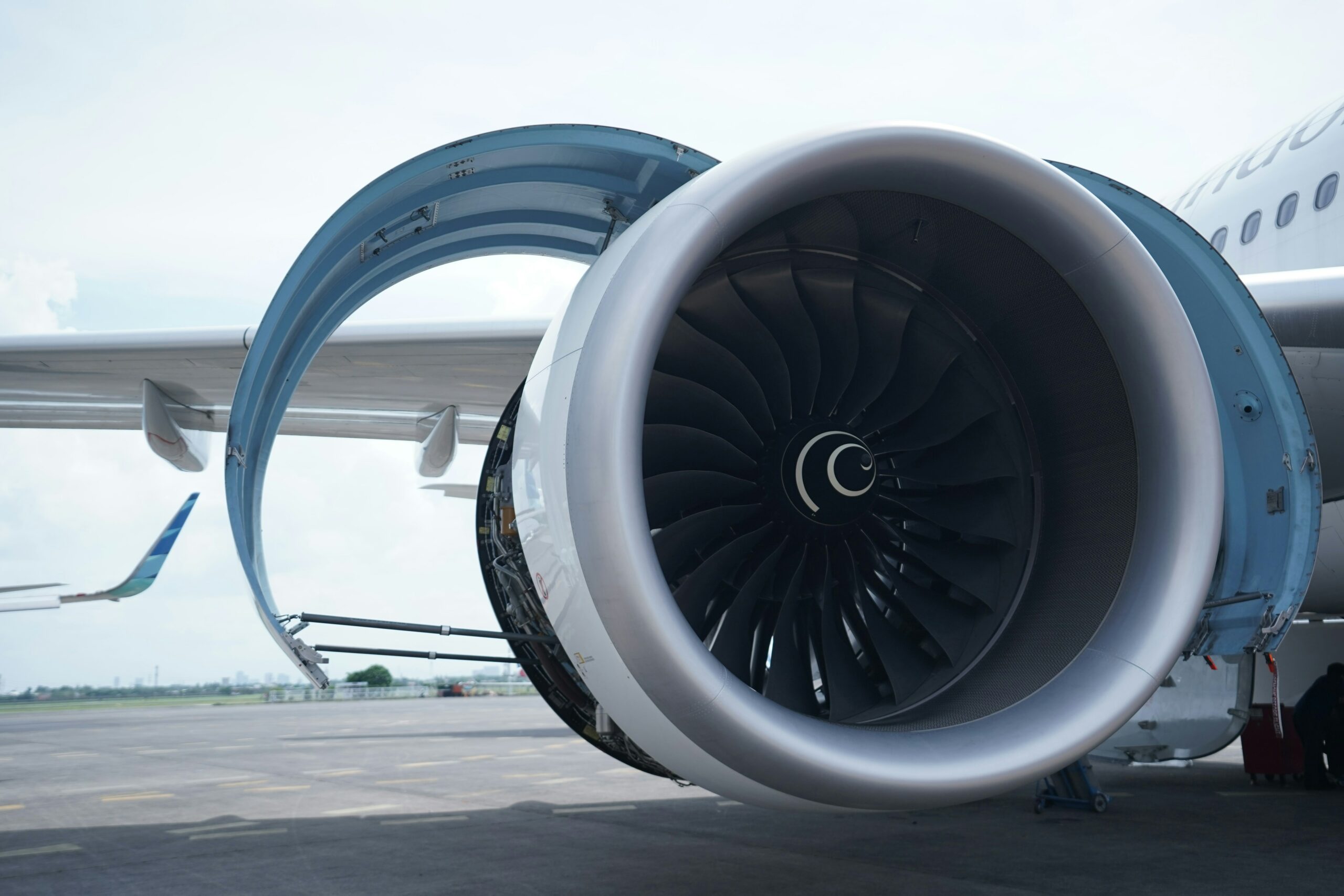 Close-up of a precision aerospace jet engine turbine showing critical components